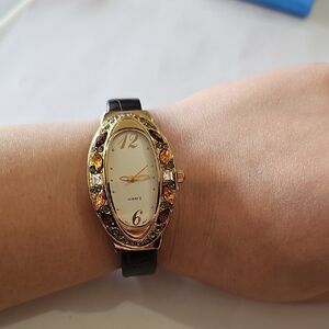 Avon Women's Watch with Gold and Black Accents